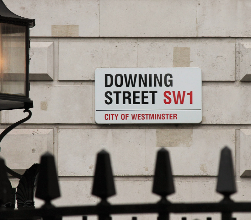 An image of the street sign of Downing Street, London