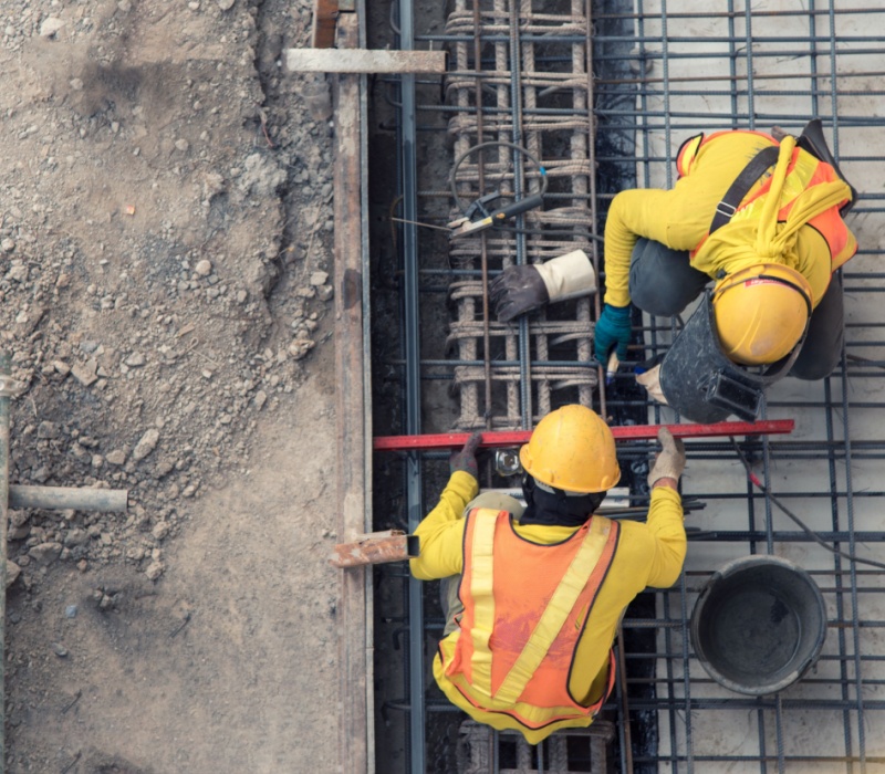 An aerial view of construction workers.