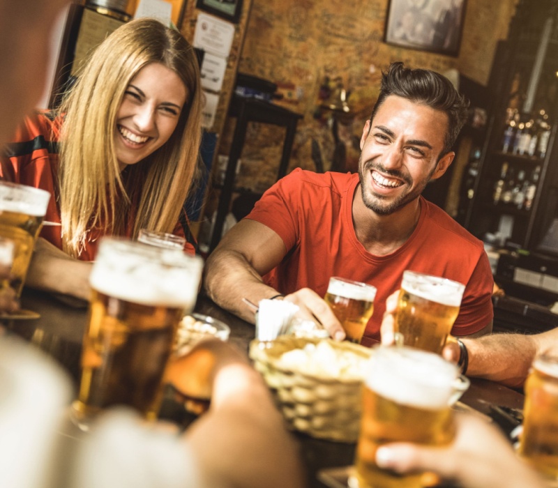 Friends having a drink in the pub.